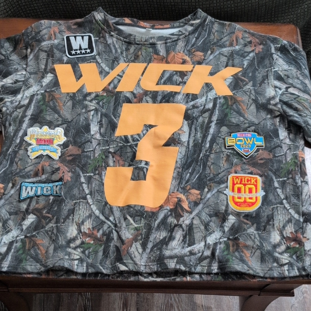 Camouflage Graphic T-Shirt with Orange Accents